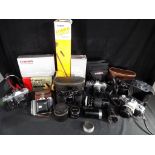 Photography - a quantity of cameras and photographic equipment to include a Praktica LTL 3,