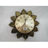 Metamec - a 20th century retro vintage sunburst starburst wall clock having Arabic and baton