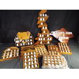 Thimbles - nine wooden displays various sizes and themes,