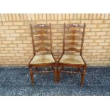 Two mahogany chairs with rush seats