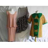 Vintage Clothing - a straight heavily embroidered dress in green and gold with bow neckline and a