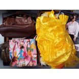 A quantity of fancy dress costumes and seven lady's handbags (2)