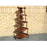 A five tier whatnot approximately 129 cm (h)