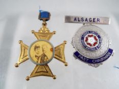 Two lapel brooches to include one Corona