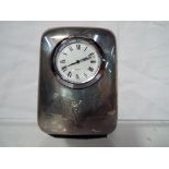 A Rolls Royce chrome clock. Estimate £55