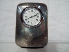 A Rolls Royce chrome clock. Estimate £55