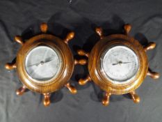 Two barometers in the form of ship's whe
