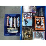 Two boxes containing a quantity of CDs and DVDs (2)