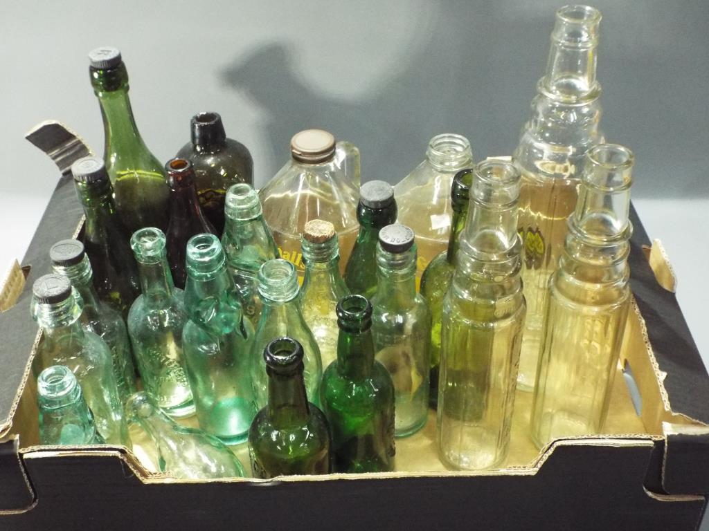 Breweriana - a collection of various collectable empty bottles and Greenall beer jug,