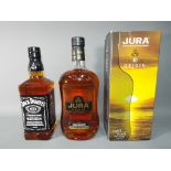 A 1 litre bottle of Jura Origin single malt Scotch whisky, 40 % ABV,