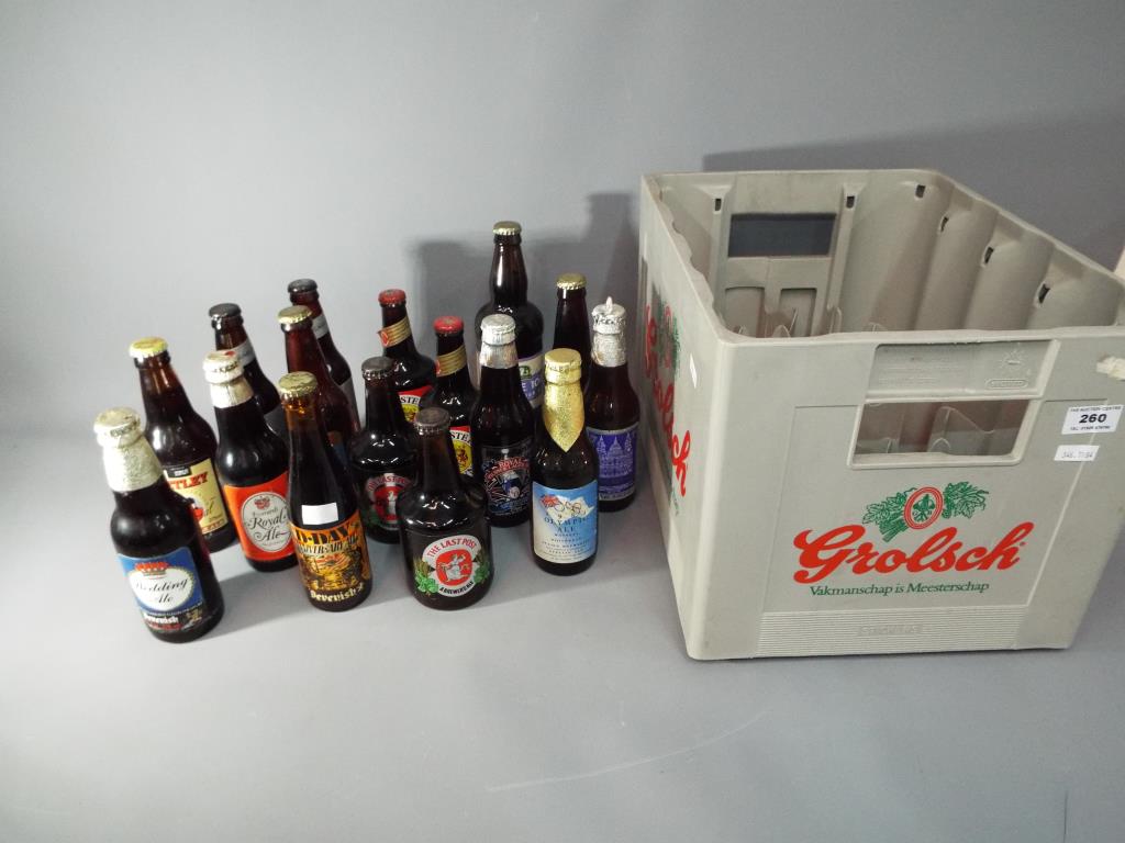 Breweriana - a Grolsch crate containing sixteen beer bottles, also included in the lot Marstons,