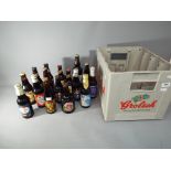 Breweriana - a Grolsch crate containing sixteen beer bottles, also included in the lot Marstons,