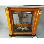 A set of Stanton analytical balance scales, model C.B.3 in glazed wooden case.