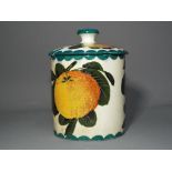 Wemyss Ware - A Wemyss marmalade pot and cover decorated with oranges,