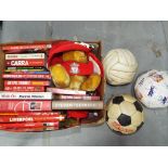 A quantity of items relating to Liverpool Football Club to include books, videos, mugs, record,