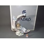 Lladro - a ceramic Lladro figurine, entitle Heavenly Slumber #06479,