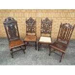 Four highly carved oak high back chairs