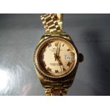A lady’s 18ct gold cased Rolex Oyster Perpetual Datejust wristwatch with 18ct President bracelet,