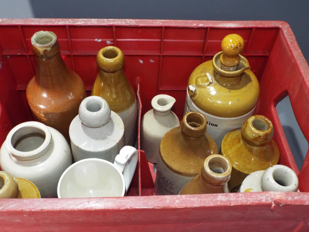 Breweriana - a Coca Cola branded crate, containing a quantity of ceramic jugs, tanker by TJ Green. - Image 2 of 2