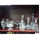 A quantity of glassware to include decanters, vases and similar.