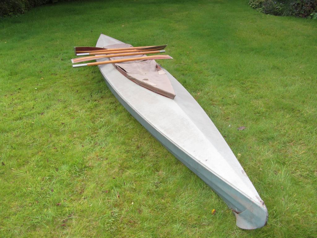 A vintage Kayak and three pairs of paddles, the kayak approx 4. - Image 2 of 3