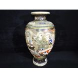 A large Oriental vase with landscape and figural decoration, character marks to the base,