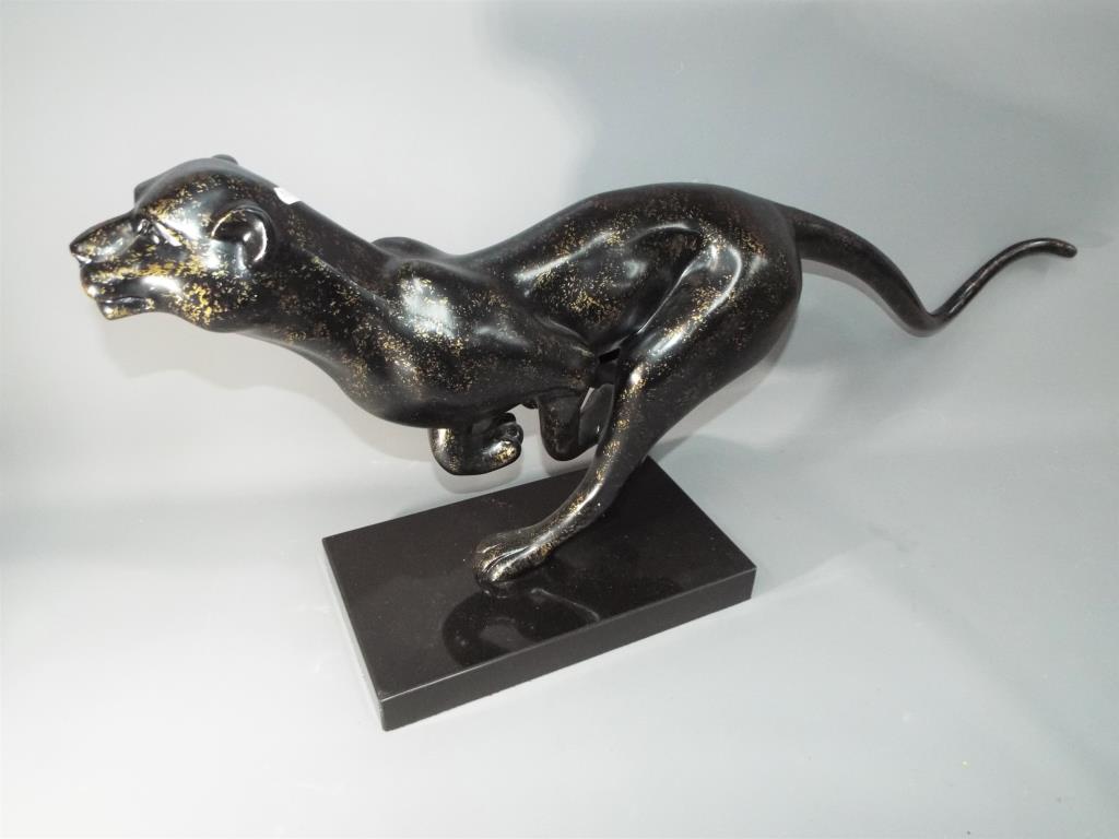 A decorative model depicting a jaguar,