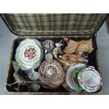 A vintage suitcase, containing a mixed lot of ceramics, metalware and similar.
