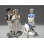 Royal Copenhagen - Two Royal Copenhagen figurines comprising # 1783 Hans and Trine,