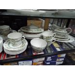 Royal Doulton - a quantity of Royal Doulton dinner and tea ware in Tonkin pattern 52 pieces in