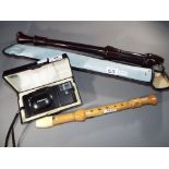 Two Schott Approved recorders, one with protective case, largest 47 cm,