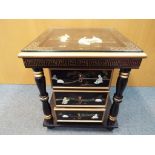 An Oriental lacquered three-drawer chest with hand-painted decoration and glass top,
