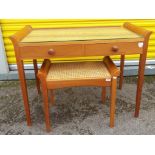 A desk by Cotswold Caners with glass top and matching stool,