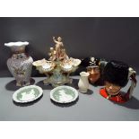 A lot to include two Royal Doulton character jugs comprising The Guardsman D6755 and Long John