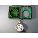 A white metal cased Goliath pocket watch, marked to the white dial 8-days,