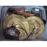 A vintage suitcase, containing large quantity of metal ware to include brassware, horse brasses,