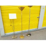 Three brass standard lamps