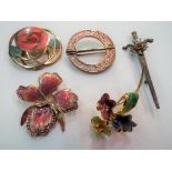 A silver Celtic brooch, stamped 925 and maker's mark, an ORTAK enamelled Scottish Thistle brooch,