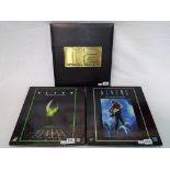 Three collectors edition laser disc set including Alien, Aliens and Terminator 2 (T2).