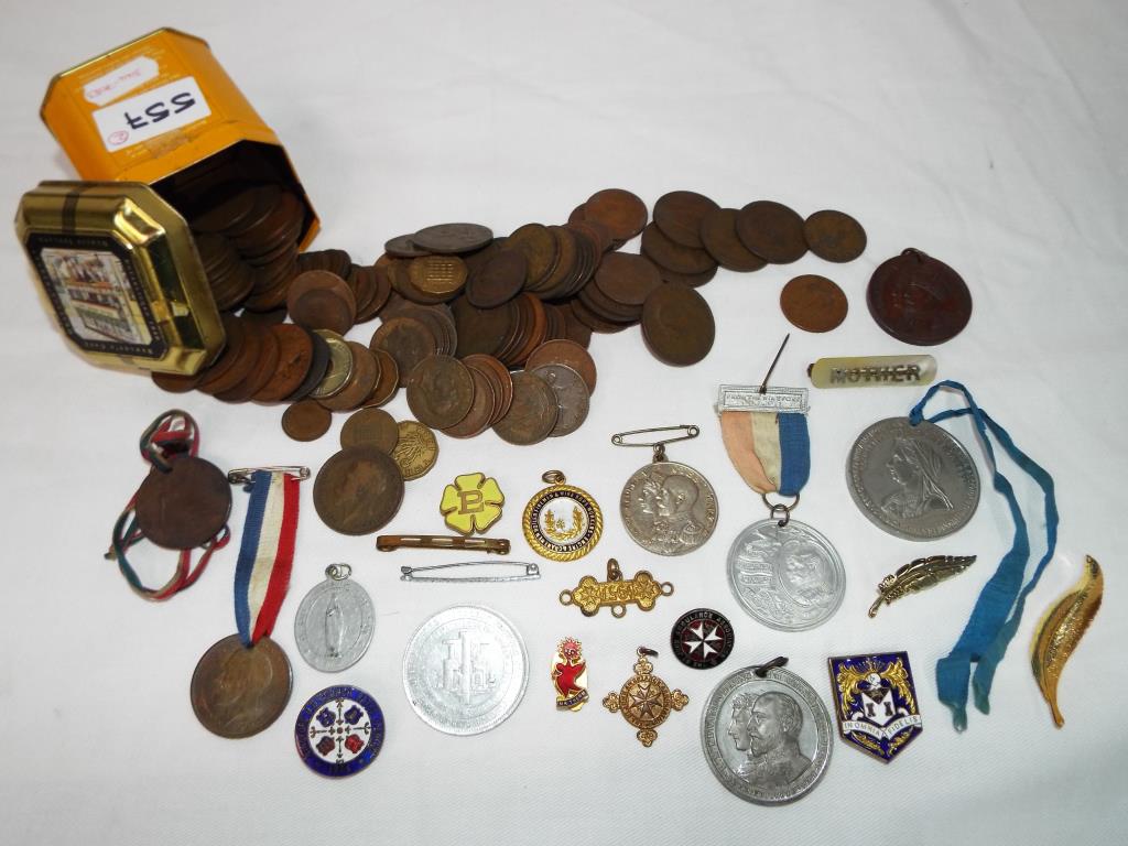 A good mixed lot of coins and commemorative medals, enamelled pin badges,