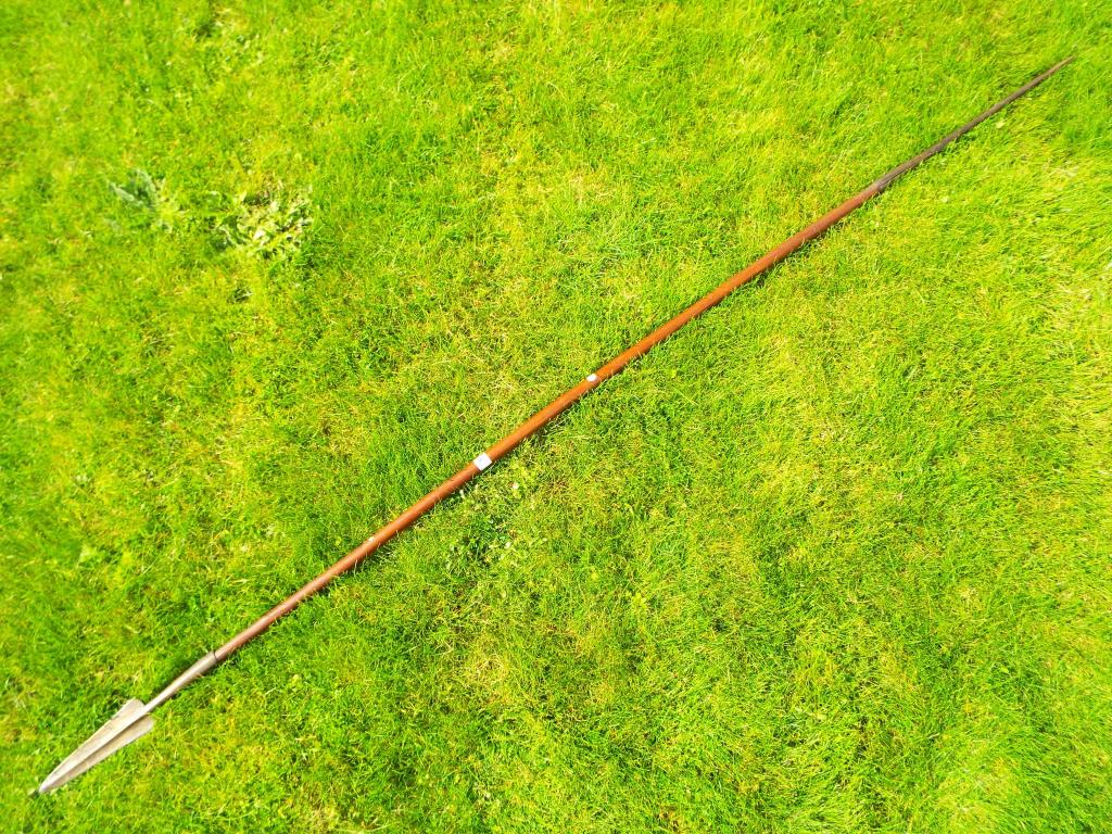 An early 20th century Maasai double ended spear, approximate length 193 cm.