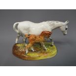 Royal Doulton - a Royal Doulton figurine Gude Grey Mare and Foal HN 2532 approximately 12 cm height.