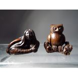 Netsuke - two vintage dark wood Japanese netsukes one in a form of an owl,