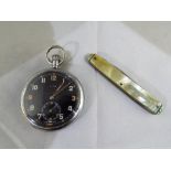 A Cyma British military issue pocket watch, stem wound with black dial and Arabic numerals,