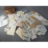 Philataly - a woven box containing a quantity of UK and Worldwide sorted postage stamps