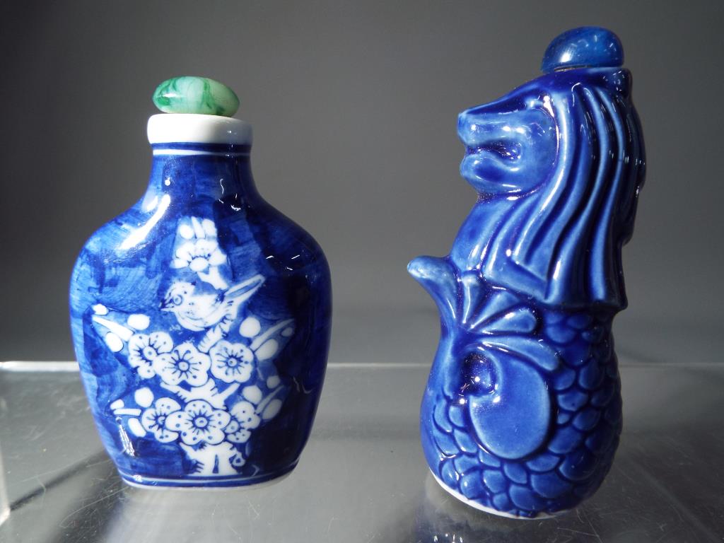 Two Oriental perfume/snuff bottles, one is signed.