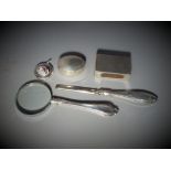 A small collection of silver hallmarked items to include pill box, matchbox cover,