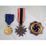 Medals - Lot to include a Kriegsverdienstkreuz ( War Merit Cross with Swords 2nd class) with