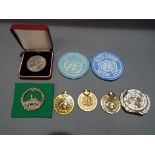 Three United Nations medals (no hallmarks) with UN cloth badge and other