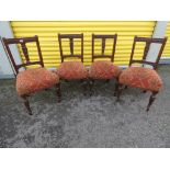 Four upholstered dining chairs with carved decoration (4)